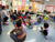 Lara Hocheiser doing yoga and mindfulness with a Kindergarten class for a Community Helpers Unit
